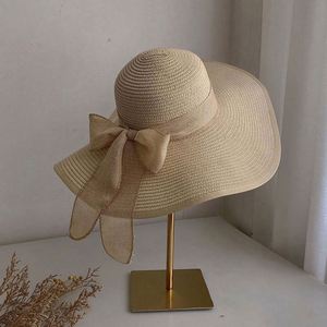 Outdoor Handmade Foldable Wide Brim Straw Sun Beach <b>Hat</b> <b>Summer</b> Beach Big Floppy Straw <b>Hats</b> With Bow - Product Image 1