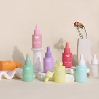 Flacon compte-gouttes en verre personnalisé rose de luxe de 30ml boîte de conteneur de dose de goutte oculaire cosmétique vide pour le sérum et l'huile essentielle de soins de la peau