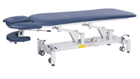 Table de massage électrique Chaoyang moderne en cuir véritable, pliable, avec cadre métallique et éponge haute densité, pour usage commercial en salon.