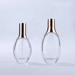 Lotion haut flache runde klare flasche luxus 30ml 50ml 100ml glas flasche rose gold pumpe kosmetische