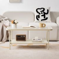 Table basse style crème avec plateau en verre, structure métallique, design minimaliste de luxe léger, rangement portable pour petit appartement ou salon