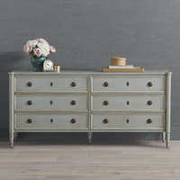 Commode à 6 tiroirs de style campagne française en chêne massif, idéale pour une chambre à coucher luxueuse.