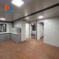 Elegante Casa Contenedor Prefabricada Moderna de Doble Ala Expandible con Baño Sanitario para Estadía en Paisajes Montañosos