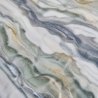 Dalle de pierre frittée polie Kuli Blue Premium, finition veinée blanc-bleu, pour murs et sols de cuisine, projets hôteliers et villas