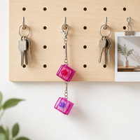 Porte-clés électronique transfrontalier en plastique avec LED, jouet anti-stress, pendentif pour clavier, idéal comme cadeau