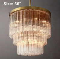 Lustre central moderne en laiton doré et verre soufflé de Murano, à trois niveaux et hauteur réglable, pour salon américain de luxe