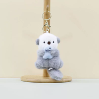 Nouveau porte-clés en peluche QY, petit pendentif en forme d'otter de mer de dessin animé, avec poisson et chien de mer, poupée en peluche, pendentif pour sac d'école