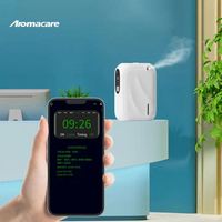 Diffuseur d'arôme d'huile essentielle fixé au mur de petit bureau d'air électrique de restaurant avec logo