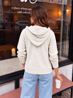 Cardigan zippé à capuche en maille unie respirante 100 % polyester pour femme, à manches longues, avec poches plaquées, style décontracté et sportif
