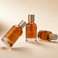 Vente en gros de flacons de parfum en verre personnalisés, 30 ml, 50 ml, 100 ml, ronds, gravure personnalisée, couleurs personnalisées avec emballage en boîte