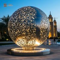 Sculpture sphérique lumineuse en or creux TREVI |   Globe lumineux LED en acier inoxydable miroir pour jardin et place en plein air