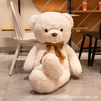 Greenmart Grand ours en peluche avec nœud papillon Cadeau en peluche Décoration de la maison Peluche de Noël