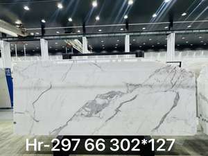 แผ่นหินอ่อนคาลาคัตต้าขัดเงาคุณภาพพรีเมียม นำเข้าจากอิตาลี สีขาวบริสุทธิ์ เป็นมิตรกับสิ่งแวดล้อม ลายเส้นสีเทาสง่างาม เหมาะสำหรับตกแต่งภายในวิลล่าหรู - Product Image 2