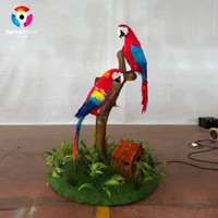 Perroquet animatronique réaliste rouge grandeur nature, simulation d'ara avec son et mouvement pour la décoration de parcs à thème jungle et jardins