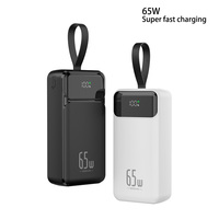 Banque d'alimentation portable 65W à charge rapide 30000mah Excellent chargeur pour ordinateur portable Matériel PVC solide Double sortie USB pour téléphones portables
