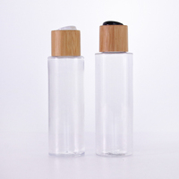Flacon pulvérisateur cosmétique en plastique PET écologique de 30 ml avec couvercle en bois, modèle BMP001 de la marque Uzone