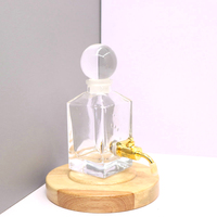 Bouteille de parfum en verre de 250ml bouteille d'affichage de décanteur bouteille en verre d'huile d'oud avec robinet