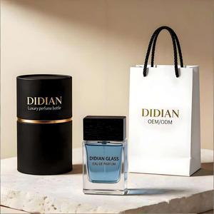 Personaliza tu botella atomizadora <span class=keywords><strong>de</strong></span> perfume <span class=keywords><strong>de</strong></span> vidrio transparente <span class=keywords><strong>de</strong></span> lujo cuadrada <span class=keywords><strong>de</strong></span> 30ml, 50ml, 100ml, vacía, con tapa. - Product Image 1