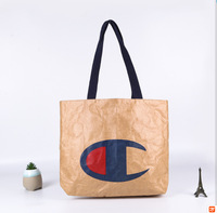 Sac fourre-tout en papier écologique étanche Dupont Tyvek Sac à bandoulière léger Logo personnalisé Lumière de luxe pour Shopping Travail Quotidien Extérieur
