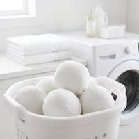 Boules de séchage en laine écologiques personnalisées : réduisent l'électricité statique et les peluches des tissus