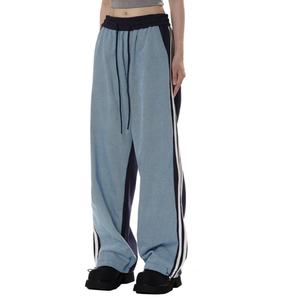 กางเกงจ็อกเกอร์ลำลองสไตล์ยูนิเซ็กส์แบบสวมใส่สบายทรงโอเวอร์ไซส์ มีเชือกผูกเอว แต่งผ้าต่อกัน สไตล์สตรีทแวร์ กางเกงวอร์มทรงหลวมสำหรับผู้ชาย ขายส่ง - Product Image 2