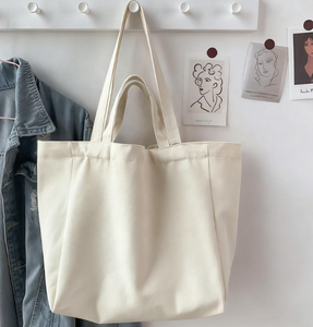 กระเป๋าผ้าแคนวาสสะพายไหล่แบบหนาพิมพ์โลโก้ได้ตามต้องการ สีขาว กระเป๋าถือผ้าฝ้ายสำหรับผู้หญิง ใช้สำหรับเดินทาง ช้อปปิ้ง และกิจกรรมกลางแจ้ง - Product Image 1