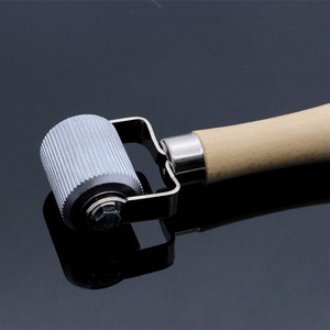 Rouleau de réparation de pneus, compresseur en nylon, outil manuel pour la réparation et le compactage des pneus - Product Image 1