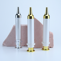 Bouteilles à pompe sans air durables et légères Stylo à crème pour les yeux de 10ml Tube à double paroi de couleur personnalisée Seringue à bouteille sans air