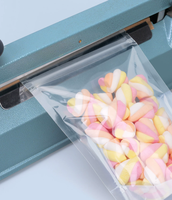 Sachet Doypack en plastique transparent mat givré refermable avec fermeture éclair pour le stockage de snacks, noix, bonbons et aliments secs