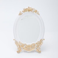 Miroir mural rond en résine en forme de soleil, style antique noir, cadre creux, miroir décoratif pour la décoration de hall d'hôtel, fabrication OEM