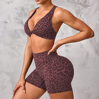 Ensemble 2 pièces de yoga transfrontalier anti-transpiration imprimé léopard avec short et soutien-gorge dos couvrant à design torsadé en Spandex/Nylon pour femme