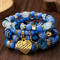 Ensemble de 4 bracelets élégants pour femmes, style bohème ethnique, avec pendentif en forme de cœur, multi-couches, perles
