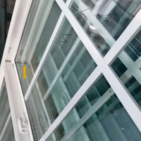 Nouvelle fenêtre en PVC à double battant avec mécanisme de bascule et grille, style américain