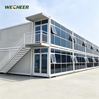 Maisons préfabriquées à faible coût en panneaux sandwich imperméables et ignifuges, conteneurs plats pour projets de camps miniers