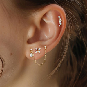 Boucles d'oreilles en alliage de zinc en forme de fleur avec incrustation de zircon pour bijoux de piercing tendance pour les fêtes - Product Image 1
