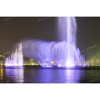 Fontaine musicale programmable avec effet d'eau dansante et lumières LED colorées pour aménagement paysager commercial, installation sur site