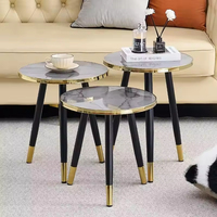 Table basse ronde mobile moderne avec pieds en métal et support en fer, design haut de gamme de petite taille, idéale pour le salon