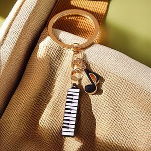 Nuevo Llavero de Moda 2026 con Diseño de Nota Musical y Tecla de Piano - Product Image 3
