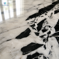 Table d'appoint en marbre noir Luca Calacatta |   Table d'appoint en marbre naturel massif avec plateau arrondi et base en pierre en forme de X pour salon