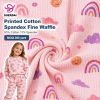 Tela de punto gofrado de algodón y elastano estampada, transpirable, de baja contracción, para pijamas y ropa de dormir infantil, venta al por mayor por rollo para fábricas.