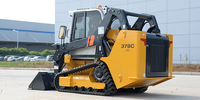 Chargeuse compacte sur pneus 378C avec attache rapide et multiples accessoires pour la construction