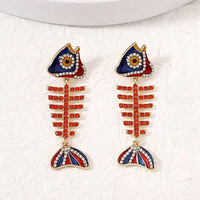 Boucles d'oreilles pendantes créatives et élégantes en alliage en forme de poisson, avec strass et motif arête de poisson, bijoux fantaisie vintage pour femme, pour les fêtes et le quotidien
