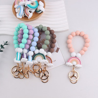 Neu Eingetroffenes Silikon-Regenbogen-Perlenarmband Schlüsselanhänger für Frauen Elastisches Armband Schlüsselring Autoschlüsselhalter Rucksack-Anhänger