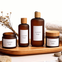 Pot de beurre corporel de luxe avec logo personnalisé 50g 150g 250g 500g, pot en plastique ambré transparent givré pour crème cosmétique avec couvercle en bambou