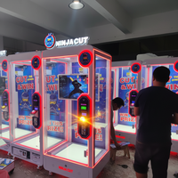 Machine de découpe de poupées personnalisable à monnayeur, jeu d'arcade NINJA CUT par Leon, avec construction en métal, plastique et acrylique, plug-in