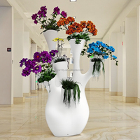 Pot de fleurs créatif YW019 en forme de branche d'arbre pour hall d'hôtel, jardin et complexe hôtelier, en fibre de verre, pour décoration végétale