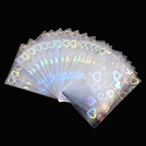 Protège-cartes holographiques arc-<span class=keywords><strong>en</strong></span>-ciel JIN OU Premium 66x91mm, <span class=keywords><strong>film</strong></span> laser transparent pour cartes PKM et cartes de sport - Product Image 6