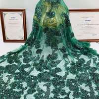 Tissu en dentelle brodée de sequins haut de gamme 100 % polyester pour robes de soirée et robes de mariée - Prix usine