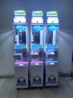 Machine de jeu à griffes miniature à pièces, machine à griffes Candy World, machine à poupées avec accepteur de billets de banque à vendre