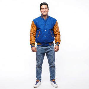 Chaquetas Universitarias Varsity para Hombre, Nueva Llegada 2026, Color Azul Rey, Mangas de Cuero Dorado Antiguo con Bordado Chenille Acolchado - Product Image 1